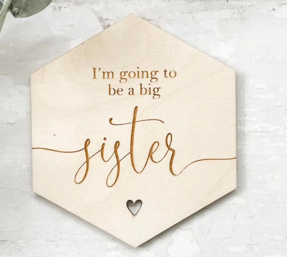 im_going_to_be_a_big_sist_0-1.webp I'm going to be a Big Sister Wooden Disc | Wooden Baby Announcement | Hexagon Baby Arrival | Social Media Flat Lay Prop | Laser Engraved