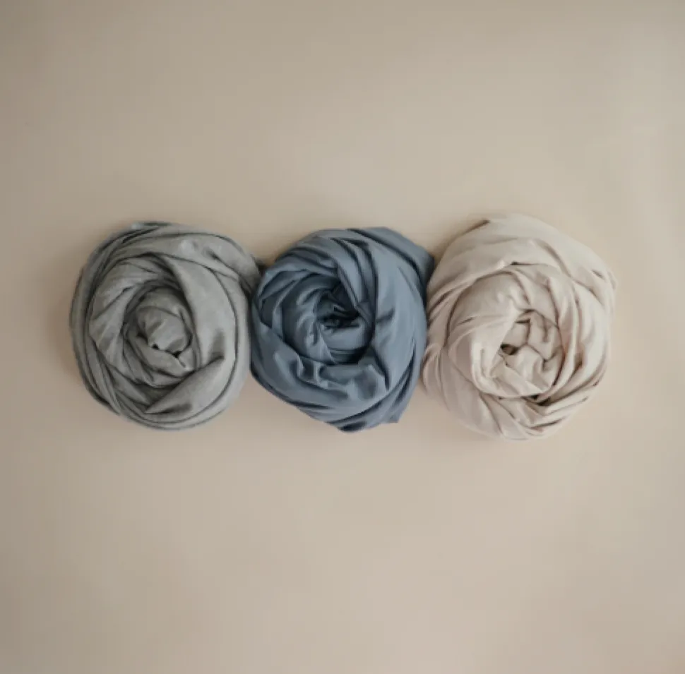mushie_baby_wrap__grey_me_0.webp Mushie Baby Wrap - Grey Melange