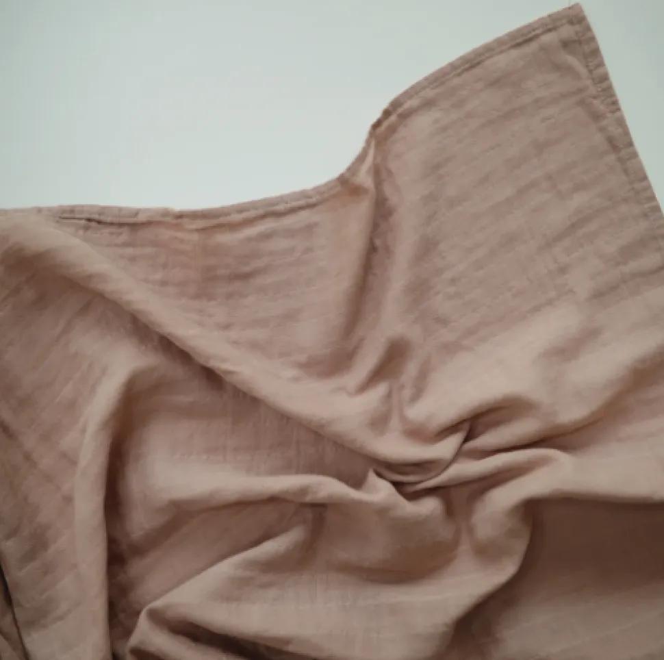 mushie_muslin_swaddle_bla_1-2.webp Mushie Muslin Swaddle Blanket - Natural